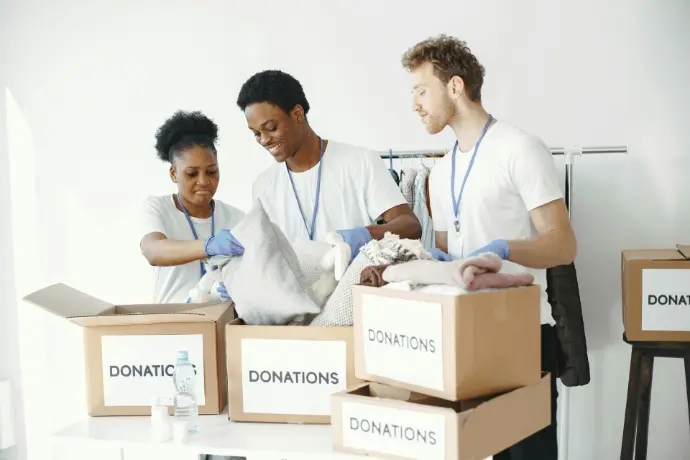 Nonprofit volunteers managing donations with ERP